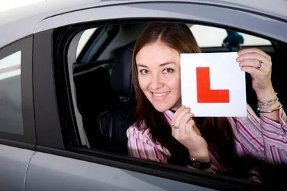 A young woman doing EDT driving lessons in Cork